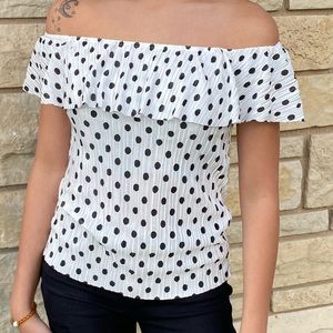White over the shoulder with black polka dots top